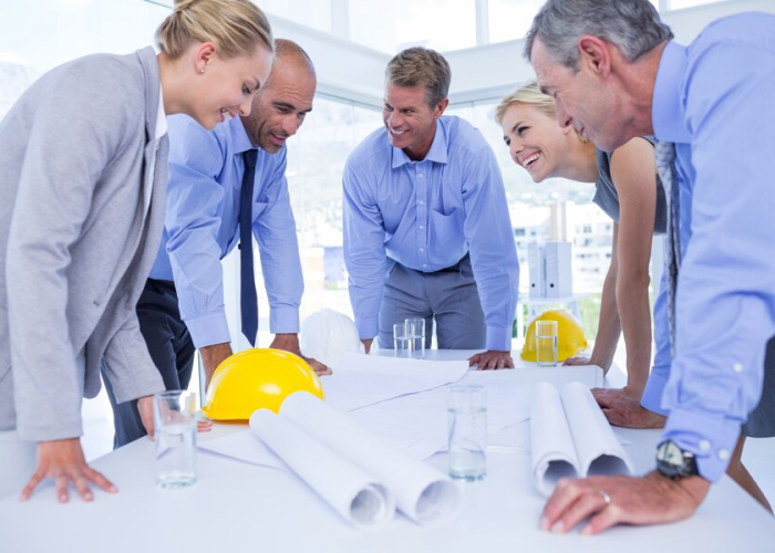 happy team business people speaking about construction plan 13339 209697 happy team business people speaking about construction plan 13339 209697